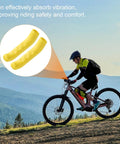 Cyclist on mountain bike with 1 Pair Silicone Brake Lever Covers For Mountain And Road Bikes Grippy Anti Slip Protector Waterproof Lightweight Handlebar Sleeve Durable Levers Protection White in focus