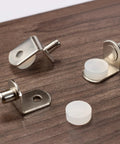 Premium Cabinet Shelf Pegs With Durable Silicone Pads For Wood Glass Metal Adjustable Shelving Hardware Mixed Quarter Inch And Five Millimeter Diameters Quick Easy Install showing metal pegs and silicone pads on wood surface.