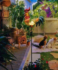 Rooster Solar Lights Outdoor Decor For Garden Yard Art Statue, illuminated at night, enhancing patio ambiance, metal and glass design.