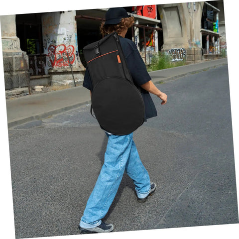 Person walking with Flat Out Rugged Oxford Drum Pouch Waterproof Percussion Storage Case Built Boss Level on their back in urban setting.