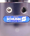 Close-up of RGG20 308590 Milling Machine Cleaning Tool by Schunk showing air or hydraulic actuation ports and label.