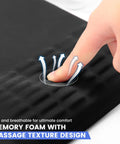 Ergonomic Mouse Pad With Wrist Rest And Memory Foam For Pain Relief, showing finger pressing into massage design surface.