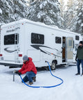 Heated Water Hose For RV And Campers With Ultra Low Temp Protection To Minus 45 Degrees Fahrenheit connected to RV in snow