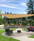 12 Ft By 12 Ft By 12 Ft Sun Shade Sail Triangle Canopy For Patio Garden And Outdoor Backyard Sand Color Breathable 185GSM HDPE Fabric Blocks UV Rays While Letting Air Flow Easy Setup And Durable Shade Solution installed above patio.