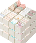 Slick 18 Piece Drawer Divider Kit Made From Tough As Nails Non Woven Fabric, baby items organized in fabric bins.