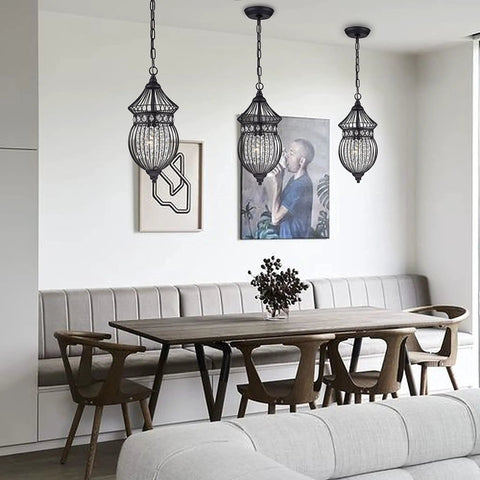 Black Globe Crystal Pendant Chandelier For Farmhouse Lighting 1 Light Dope Modern Rustic Ceiling Fixture With Height Adjustable Chain Perfect For Dining Rooms Living Rooms And Entryways hanging in a modern dining area