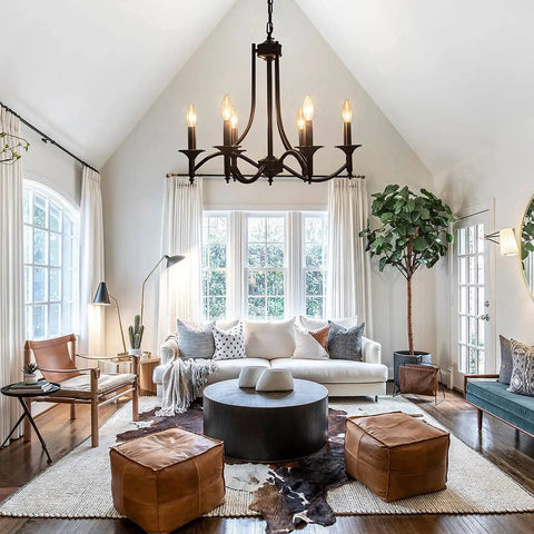 Black Farmhouse Chandelier Industrial Iron Six Light Pendant in a modern living room setting with natural light and rustic decor.