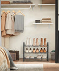 Sturdy 3 Tier Shoe Organizer Rack For Closet And Entryway, Holds Up To 12 Pairs, shown in a closet setting with coats and shoes.