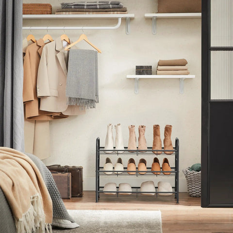 Sturdy 3 Tier Shoe Organizer Rack For Closet And Entryway, Holds Up To 12 Pairs, shown in a closet setting with coats and shoes.