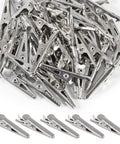 Image showing a pile of 50 Pack 28mm Metal Alligator Clips For Lab And Battery Testing, 1.1 Inch Crocodile Clip Clamps.