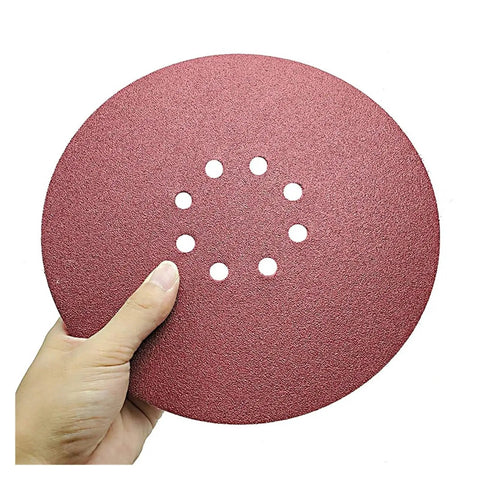 9 Inch 225mm Professional Sanding Discs With 8 Holes For Super Smooth Finish 1200 Grit High Quality Paper Wheel Set Of 50 Pieces held in hand.