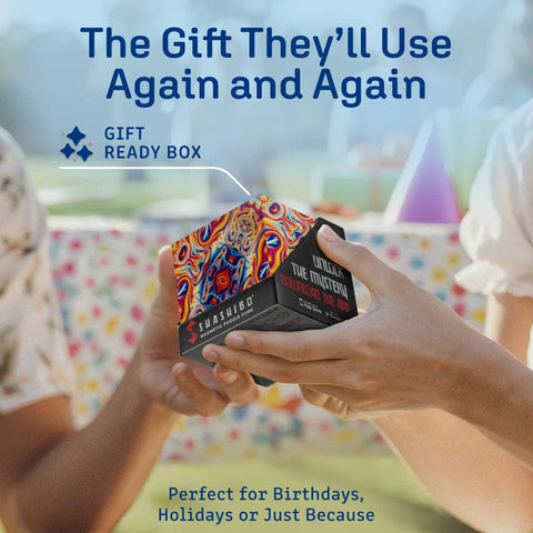 Hands holding a gift box of Shape Shifting Puzzle Cube With Ultra Strong Magnets Transforms Into 100 Plus Shapes Award Winning Fidget Toy For Sensory Fun For Kids Teens And Adults Perfect Gift For Stress Relief And Focus Spaced Out Edition