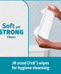 Person holding On-The-Go Travel Size Flushable Wipes Unscented With Aloe Biodegradable Wet Wipes For Sensitive Skin.