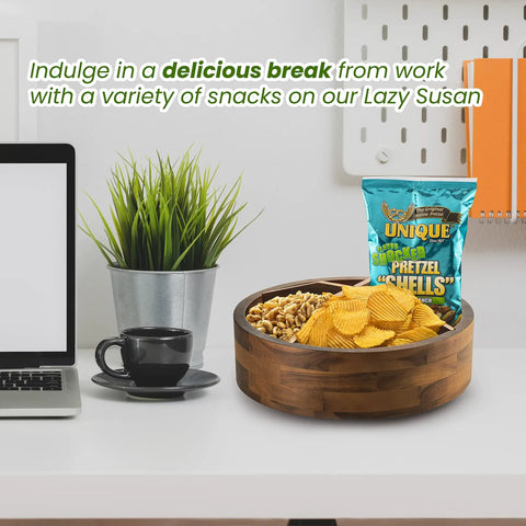 Premium 12 Inch Acacia Wood Lazy Susan Rotating Tray With Four Removable Dividers holding snacks on a desk.