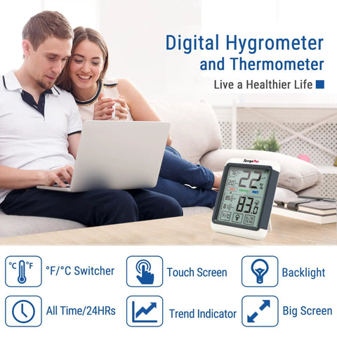 Digital Indoor Hygrometer Thermometer With Touchscreen 4Inch Large Display Easy Readings And Front Button Operation High Accuracy Humidity And Temperature Monitor For Home Or Your Pad. White and grey digital indoor hygrometer on a table