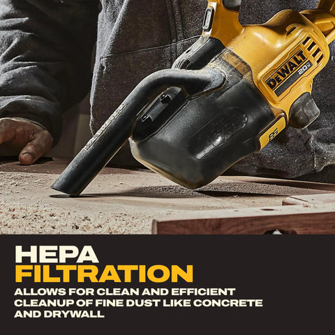 Person using Beast 20V Cordless Handheld Vacuum With HEPA Filter LED Light 46 CFM for drywall dust cleanup on workbench