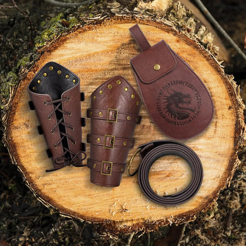 Dope 3 Piece Renaissance Accessories Set Featuring Legit Vintage Viking Belt And Premium Crafted Leather Bracers For Badass Medieval Cosplay Festival Flex on wood.