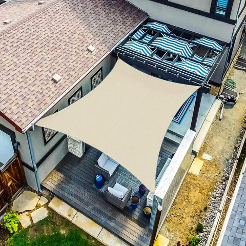 Beige 18x20 Foot Rectangle Sun Shade Sail Canopy For Patio Deck And Backyard Blocks Up To 95 Percent UV Heavy Duty 195GSM HDPE Fabric Not Waterproof D Ring Corners Outdoor Shade For Sun And Breeze installed over a patio