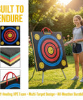 Young archer using High Density XPE Foam Archery Target 20 Inch Square for Recurve And Compound Bow Practice with scoring rings in backyard.