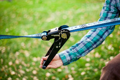Close-up of the ratchet tension system from the 60 Feet Slackline Kit With Tree Guards, Carry Bag, And Easy Setup For Family Fun, Kids And Adults.