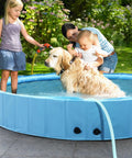 Family enjoying Massive 87 Inch Dog Pool With Sprinkler 2 In 1 Foldable Splash Pad for outdoor play with child and pet