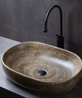 Oval Ceramic Vessel Sink for Bathroom, Retro Modern Above Counter Vanity Sink for Home or Hotel, Stylish Wash Bowl (Multi-colored-Small) with textured brown finish.