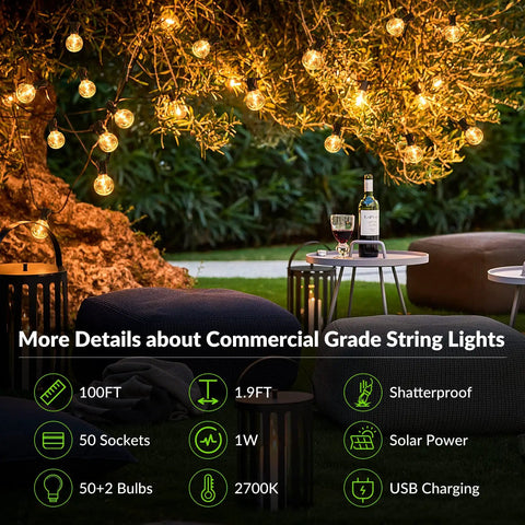 Outdoor setup with 100Ft Solar String Lights With 52 LED Globe Bulbs, Warm 2700K Glow, hanging in a garden over seating area.