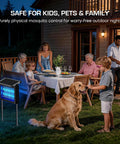 Family enjoying outdoor dinner on patio with Cordless Solar Bug Zapper With USB Recharge No Fuss 4500V High Power Mosquito Killer nearby.