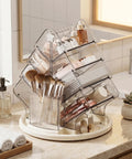 Sturdy Clear Swivel Makeup Organizer, 360 Slick Spin Lazy Susan Tray For Vanities, beauty products and brushes organized.