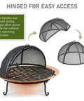 Hinged Fire Pit Spark Screen With Easy Access Lift Handle, No-Fuss Design Keeps Sparks And Embers In, Quick Open For Adding Wood, Durable Steel Mesh Shield For Patio Or Campfire, shown open over a fire pit.