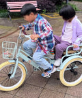 Children riding Outdoor Cruiser Tricycle For Travel And Fun Ride Ready Three Wheel Pedal Trike With Pneumatic Tires And Spoke Wheel Back Seat Tandem Style Adjustable Height Single Brake 20 Inch Light Green in park