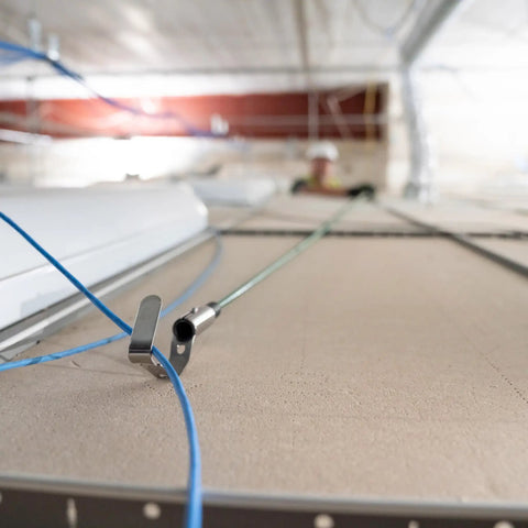 Collapsible 18 Foot Wire Pulling Fish Pole For Attics Ceilings And Crawl Spaces Far Reaching Cable Puller Tool in use on ceiling