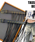 Vintage Industrial Waist Belt Featuring Heavy Copper Hardware And Flowing Tassels With Easy Adjustable Strap In Warm Coffee Brown For Daily Wear That Gives Serious Drip, displayed with tassels and buckle details.