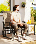 Man sitting on Outdoor Glider Chair For Patio With Steel Frame And Mesh Fabric Smooth Swing For Backyard Garden Or Porch
