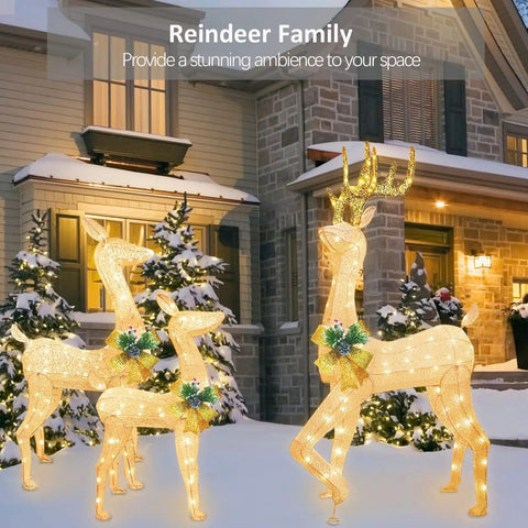 Lighted Outdoor Reindeer Family Set for Christmas 3 Piece Yard Decor With 230 Warm White LEDs Includes 64 Inch Buck 49 Inch Doe And 37 Inch Fawn Easy Setup With Stakes And Zip Ties For Festive Holiday Lawn Display in front of house