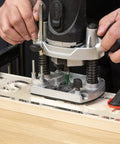 Kick Your Sign Making Routine With This Slick Clear Plastic Routing Template Set Packing Vintage Vogue Block Numbers Scaled Just Right For Dead On Precision On Every Router Job Today, showing a router in use.