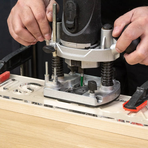 Kick Your Sign Making Routine With This Slick Clear Plastic Routing Template Set Packing Vintage Vogue Block Numbers Scaled Just Right For Dead On Precision On Every Router Job Today, showing a router in use.