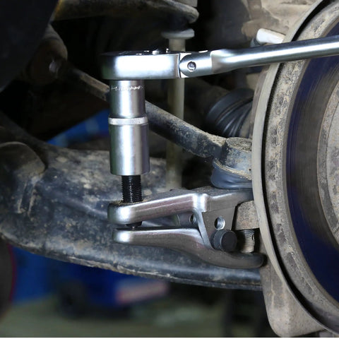 Ball Joint Separator Tool Adjustable One And One Eighth To Two And One Eighth Inch Range With Three Quarters Inch Forcing Bolt in use