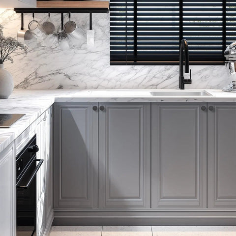 Modern kitchen with marble backsplash featuring 10 Pack Matte Black Cabinet Knobs, 1.2 Inch Round Drawer Knobs For Kitchen Cabinets.