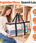 Heavy Duty Clear Storage Bins 2 Pack Extra Large Clothes Organizers With Lids in use for organizing clothing and toys.