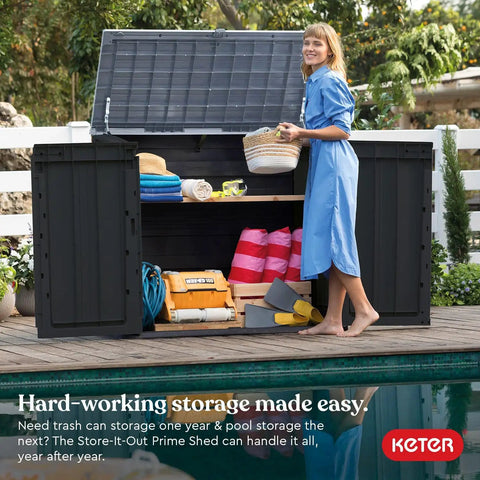 Woman organizing items in Store It Out Prime Outdoor Resin Storage Shed With Easy Lift Hinges 4.3 By 3.7 Ft, open lid shown