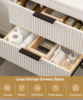 No Fuss 24 Inch Wall Mount Bathroom Vanity With Durable Resin Sink And Deep Twin Drawers showing large storage drawers filled with toiletries.