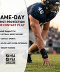 Football player wearing adjustable wrist brace with dual elastic straps for maximum support heavy duty work and sports wrist guard.