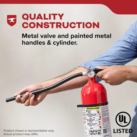 Person holding all-metal Home Fire Extinguisher For Residential And Living Areas 2A10BC with metal valve and cylinder.