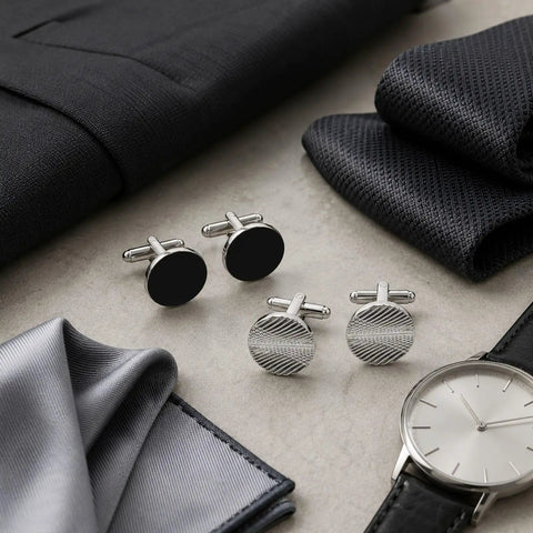 Two Pair Silver Plated French Cufflinks For Men Highlighting Smooth Black Enamel Disks and Crisp Grid Mesh Patterns on grey surface.