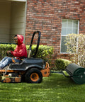Beast Of A Lawn Roller For Yard And Garden Push Or Tow Behind 30 Gallon Water Sand Filled Sod Roller Drum attached to a tractor