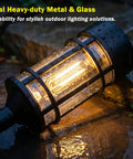 Close-up of Eight Pack Solar Pathway Lights Outdoor Waterproof 21 Inch Metal and Glass in rainy weather on stone path.