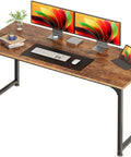 Roomy 55 Inch Home Office Desk for Gaming and Work From Home Setup, Rustic Brown Finish, Heavy Duty Metal Frame, Huge Legroom, Modern Minimalist Style, Perfect for Study, Writing, and Multi Monitor Setup, shown with dual monitors, keyboard, and tablet on rustic brown surface