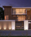 Modern house illuminated by Solar Spotlight Pack Outdoor 12 LED IP67 Waterproof Dusk To Dawn Auto On Off 2In1 Adjustable Wall Lights