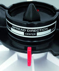 Close-up of 9 Kg Capacity Manual Spreader With Adjustable Strap And Crank, Red, showing spread direction control center part.